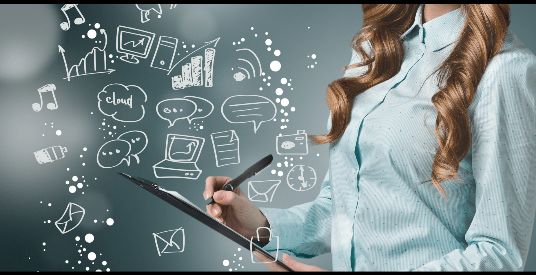 A woman holding a tablet in her hand.