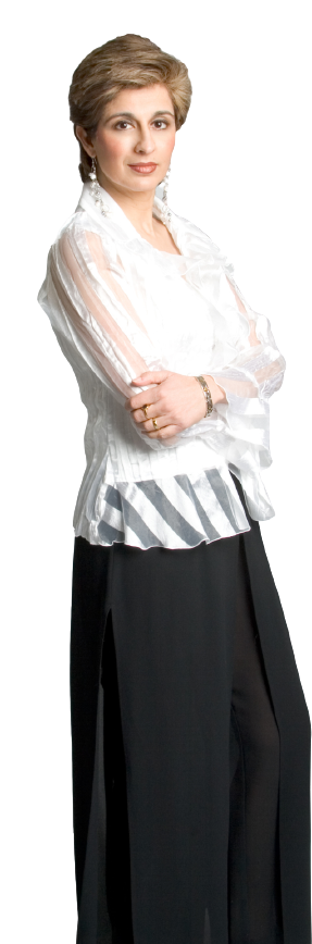 Woman in white blouse and black skirt.